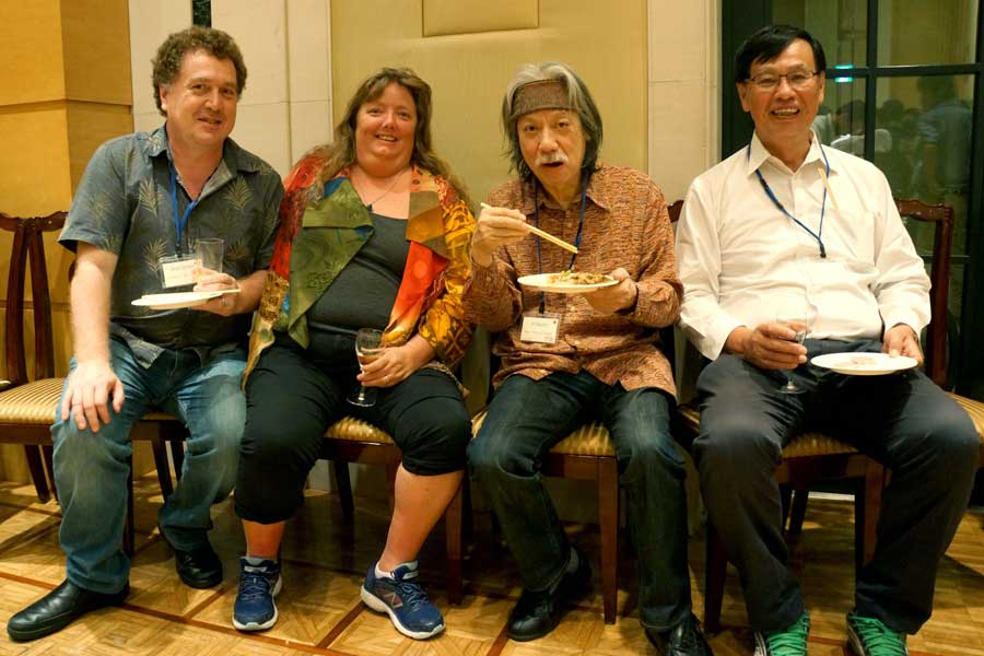 David Eppstein, Diana Eppstein, Jin Akiyama, and Naoki Katoh, at the banquet of JCGCG3, Agnes Hotel, Tokyo; photo by Toshinori Sakai